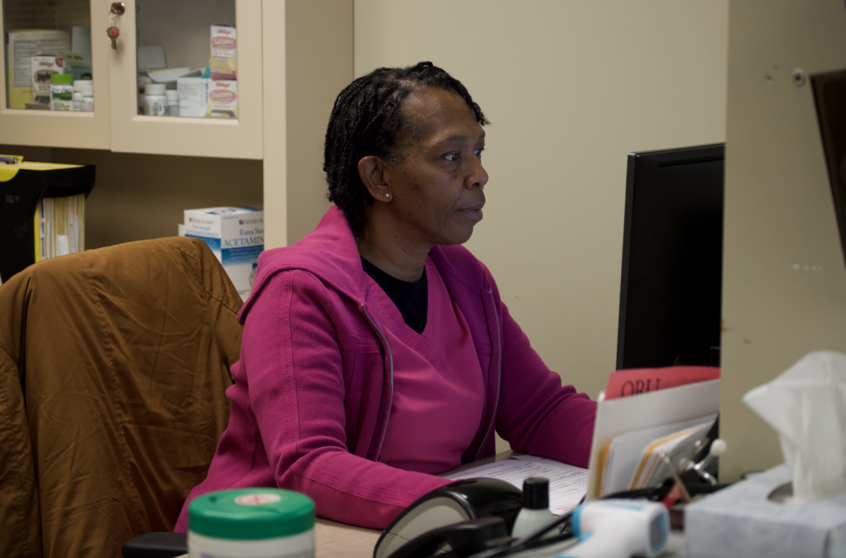 Effie Lyles, ORU’s registered nurse, advises students on flu prevention and recovery as cases rise on campus. 